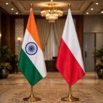 India and Poland flags in a diplomatic conference hall — symbolic image