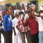 Voters queue at a polling booth (representative image)